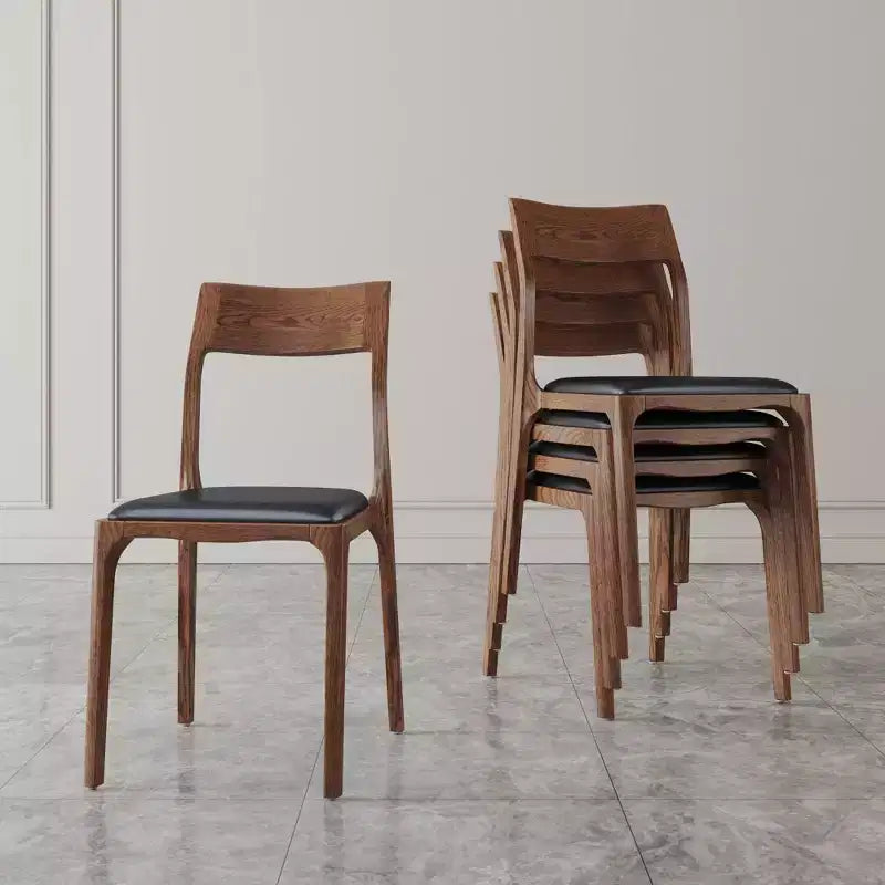 Set di 2 sedie da pranzo impilabili senza braccioli in similpelle nera
